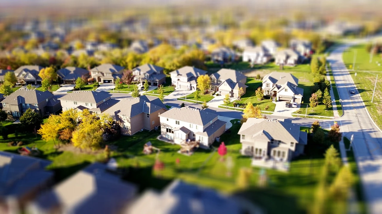 Tilt-shift view of suburban houses with autumn trees