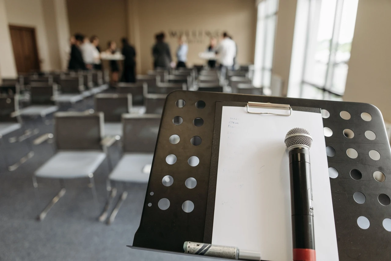 Microphone and sheet of paper on a lectern